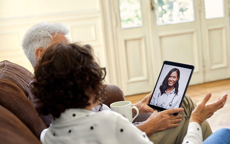 patients looking at the doctor on a tablet