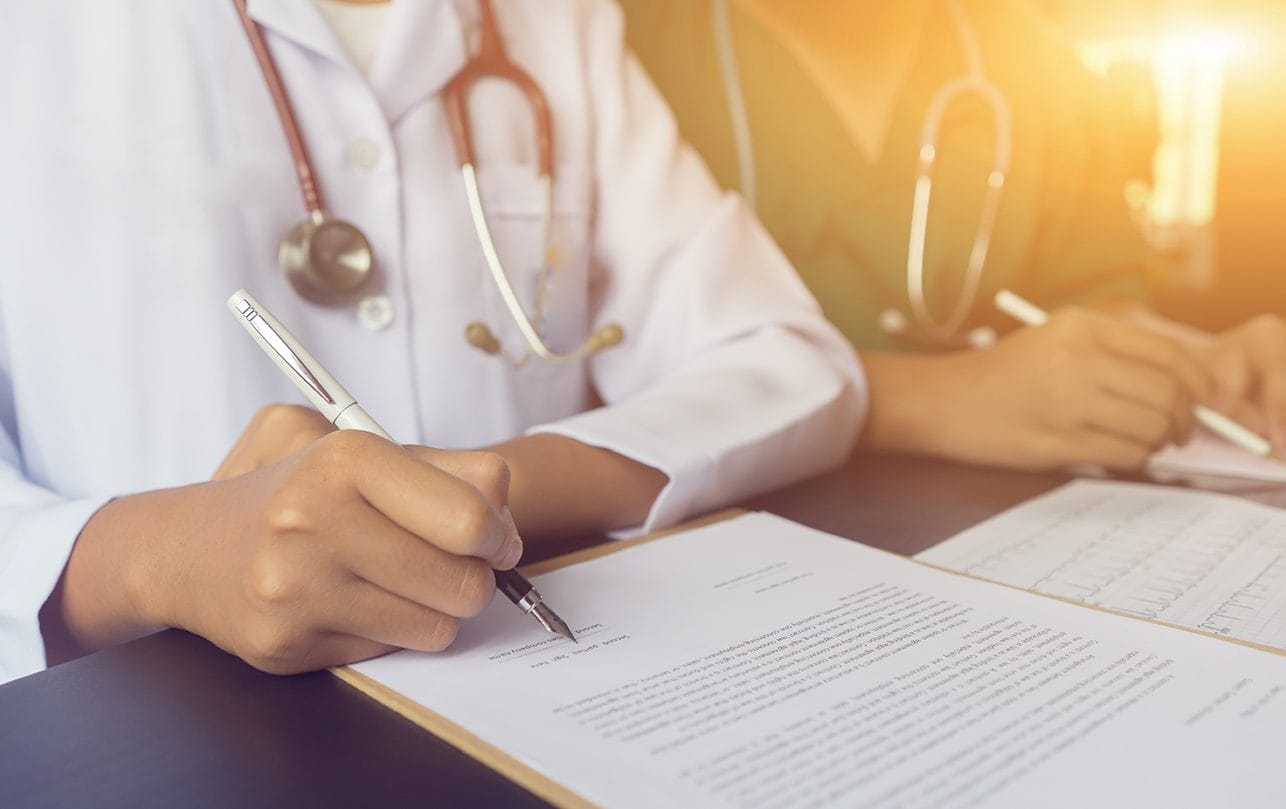 doctor and patient smiling