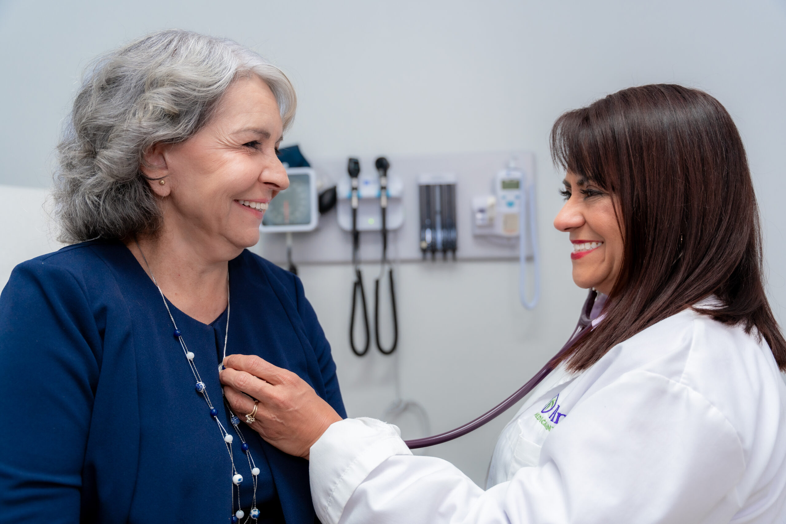 Palm Primary Care provider with patient